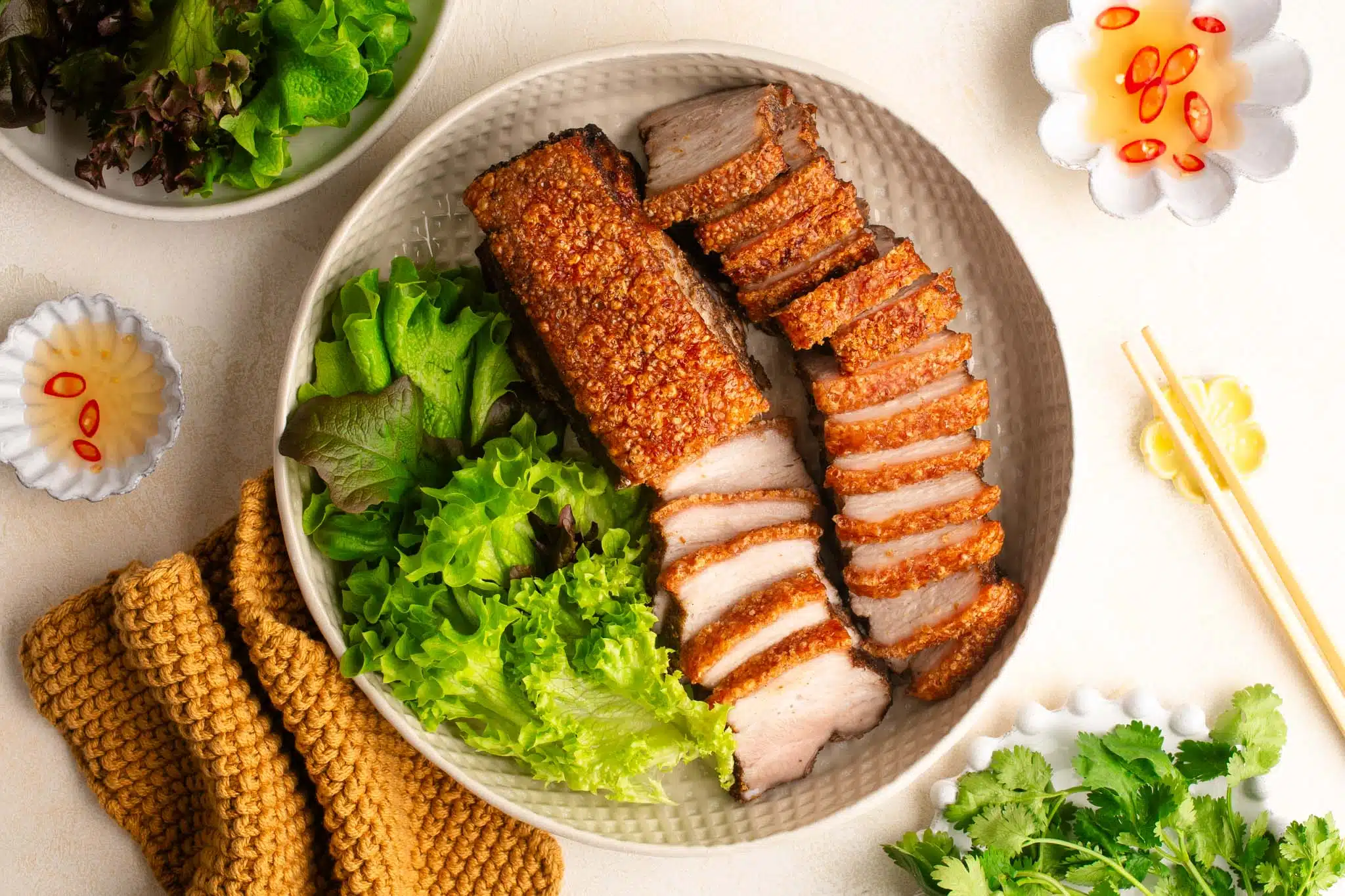 air fryer crispy pork belly served with salad and dipping sauce